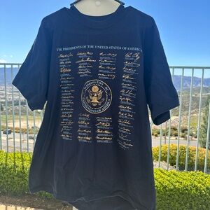 Navy blue vintage 1997 USA Presidents T-shirt with gold lettering